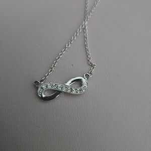 Silver Reversible Infinity Pendant Necklace with Clear Stones And Black Stones